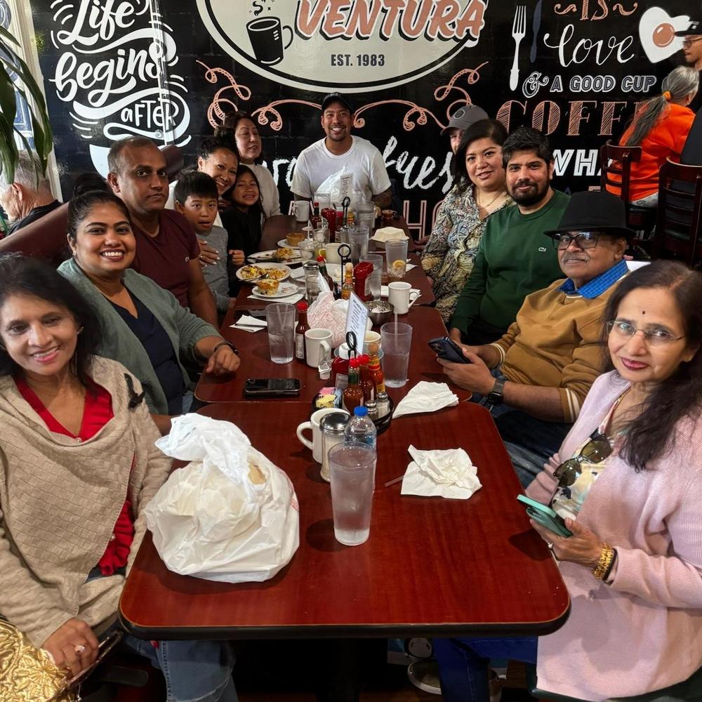 Angela and Pramod with family