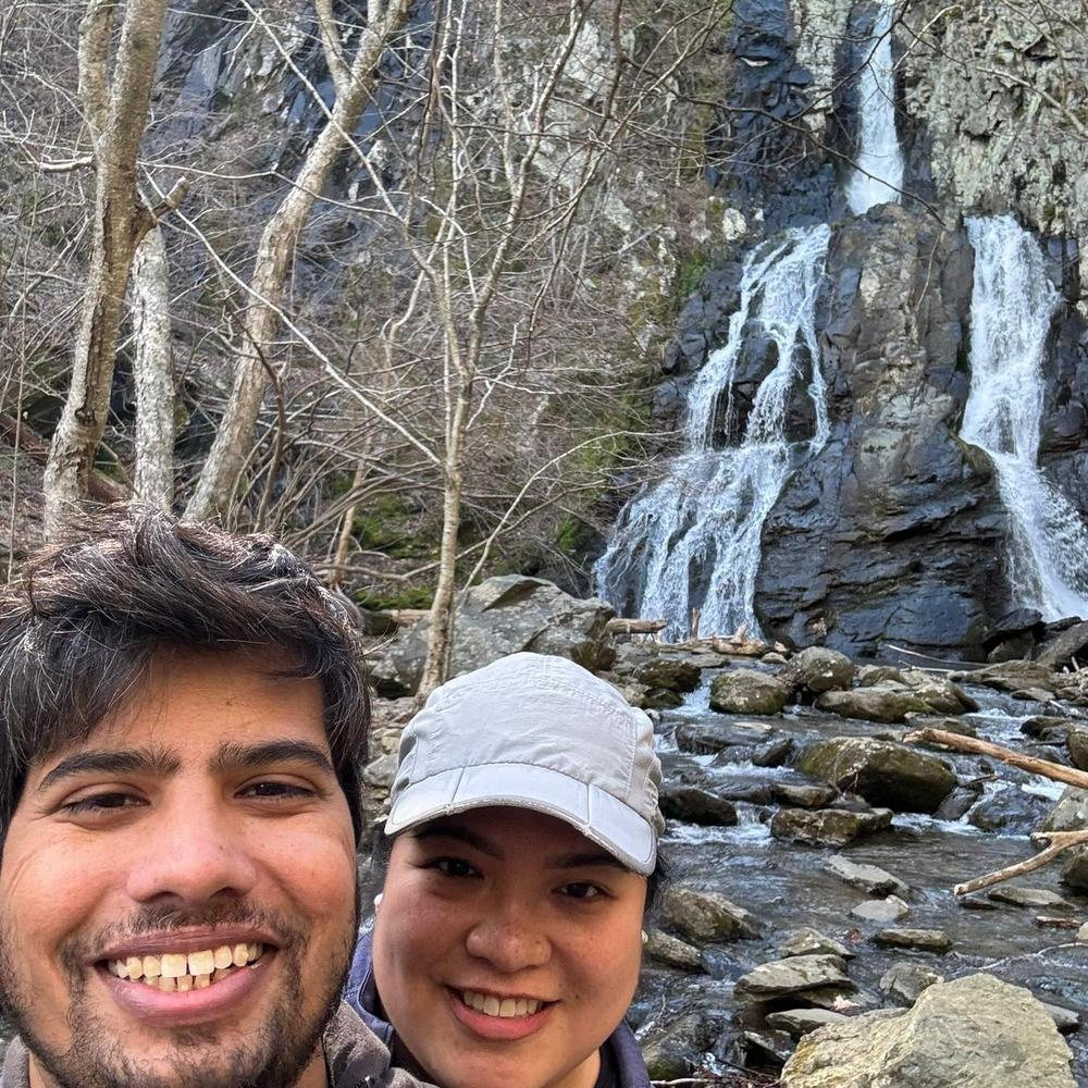 Angela and Pramod at waterfall